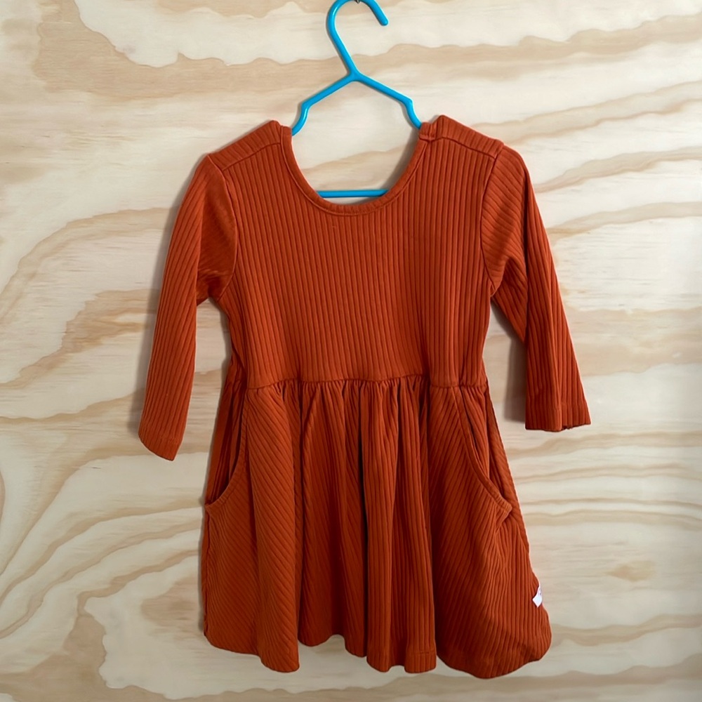3T orange RuffleButts bow back detail dress.